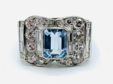 Art Deco style white gold ring set with centre aquamarine surrounded by diamonds