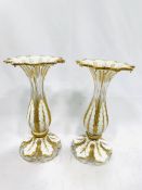 A pair of decorative gilt and white painted glass vases and a marble table lamp