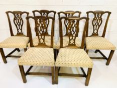 A group of four 19th century mahogany framed Chippendale style chairs