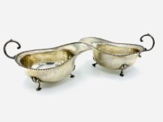 Two silver sauce boats