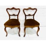 A pair of Victorian mahogany dining chairs