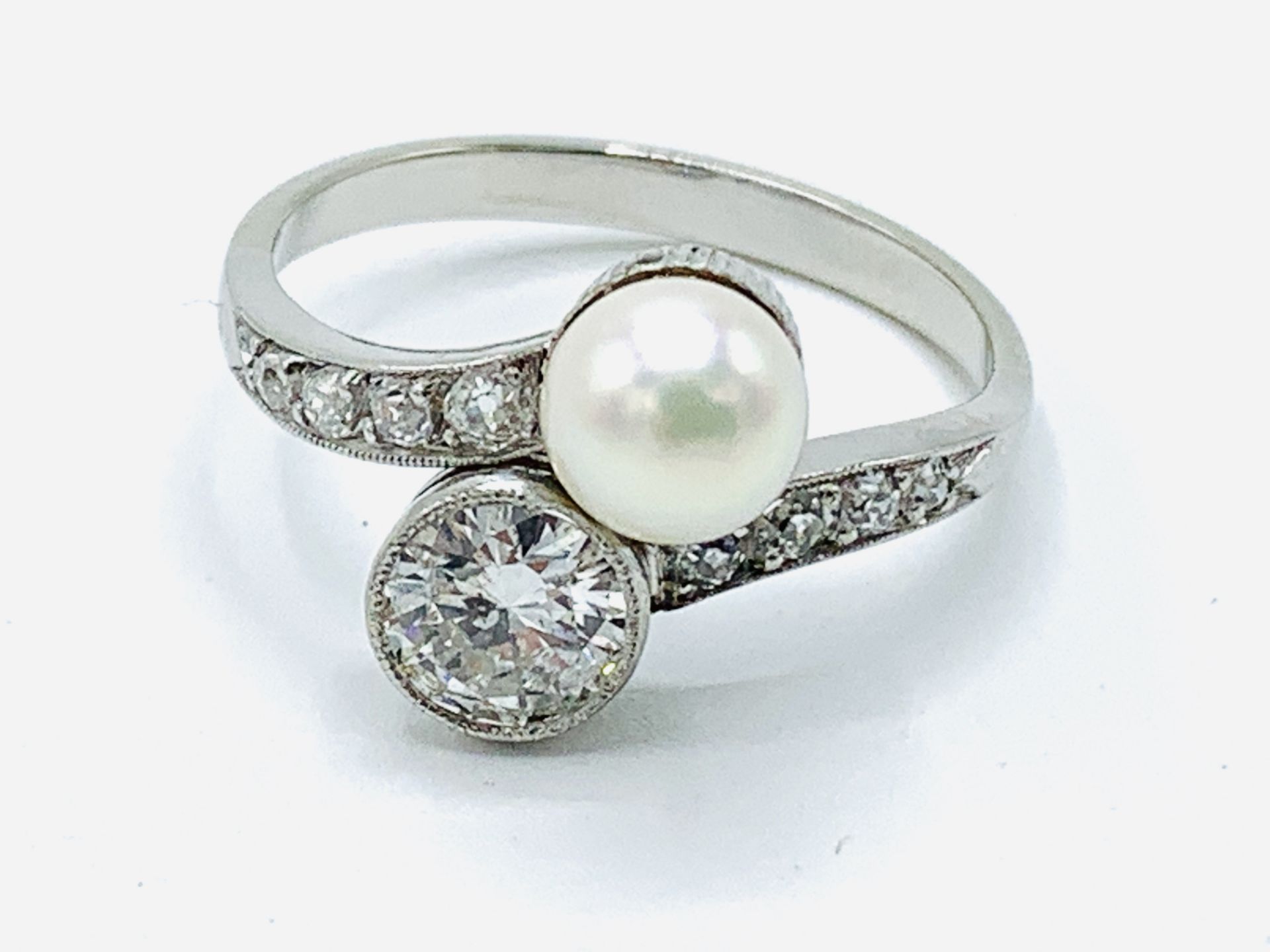 Platinum pearl and diamond ring