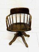 1930s oak height-adjustable swivel rail back open armchair