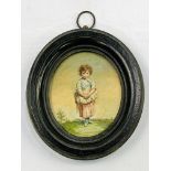 An oval framed and glazed embroidered miniature on silk of a young girl