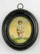 An oval framed and glazed embroidered miniature on silk of a young girl