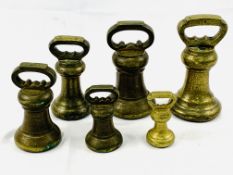 Three Avoir brass alloy bell proof weights and 3 other bell proof weights