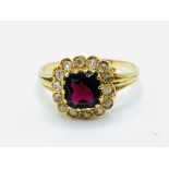 Yellow gold garnet and diamond cluster ring