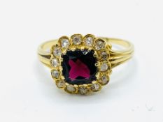 Yellow gold garnet and diamond cluster ring