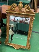 Gilt and painted decorative framed bevelled edged wall mirror