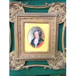 A small oil portrait of a Victorian lady in a very ornate gilt and glazed frame