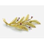 18ct gold ruby and diamond brooch in the form of a sprig