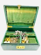 A quantity of costume jewellery, together with a green leather jewellery box