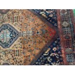 Brown and blue ground hand knotted rug