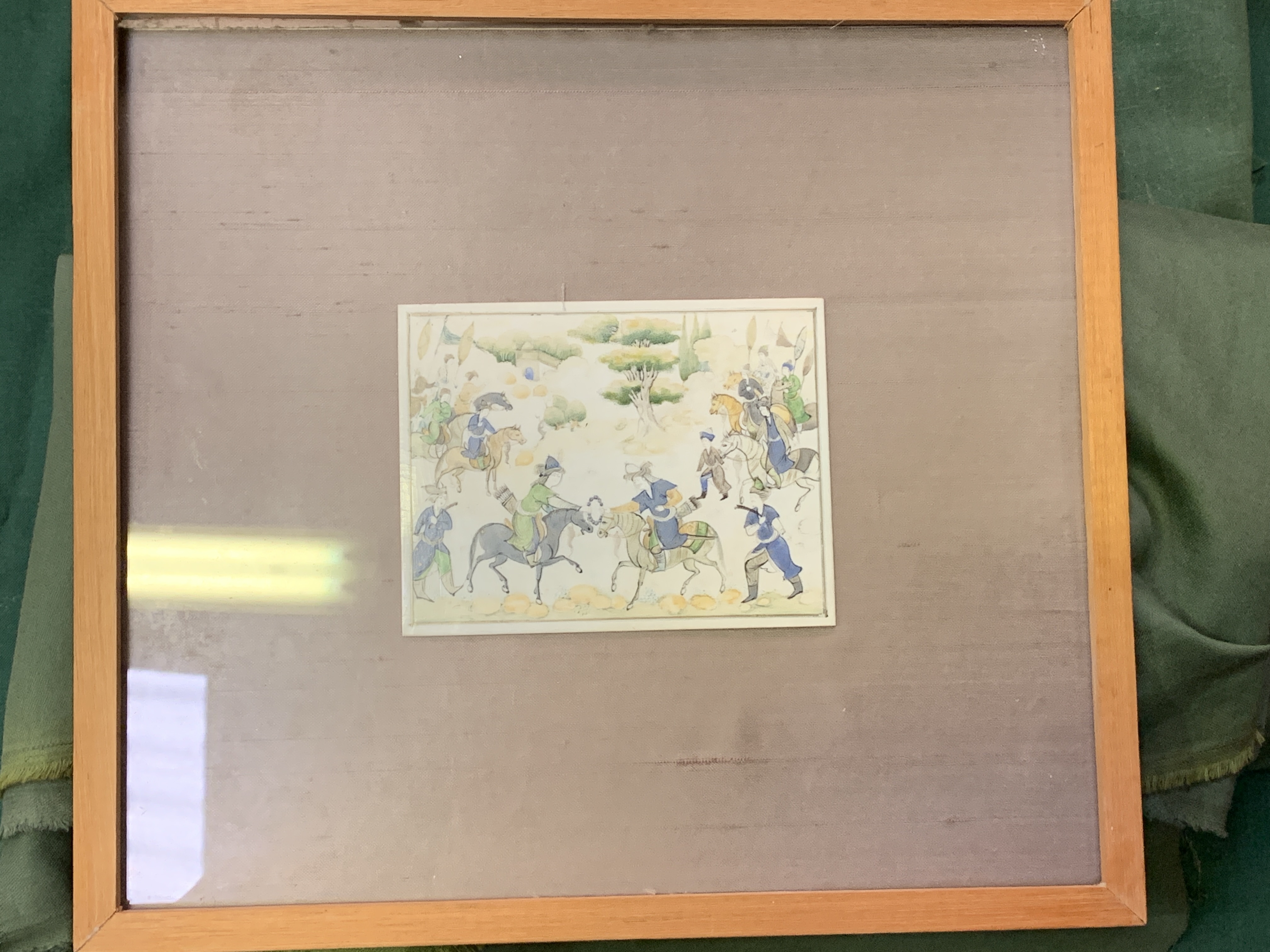 Framed and glazed painting on ivorine of Middle Eastern warriors