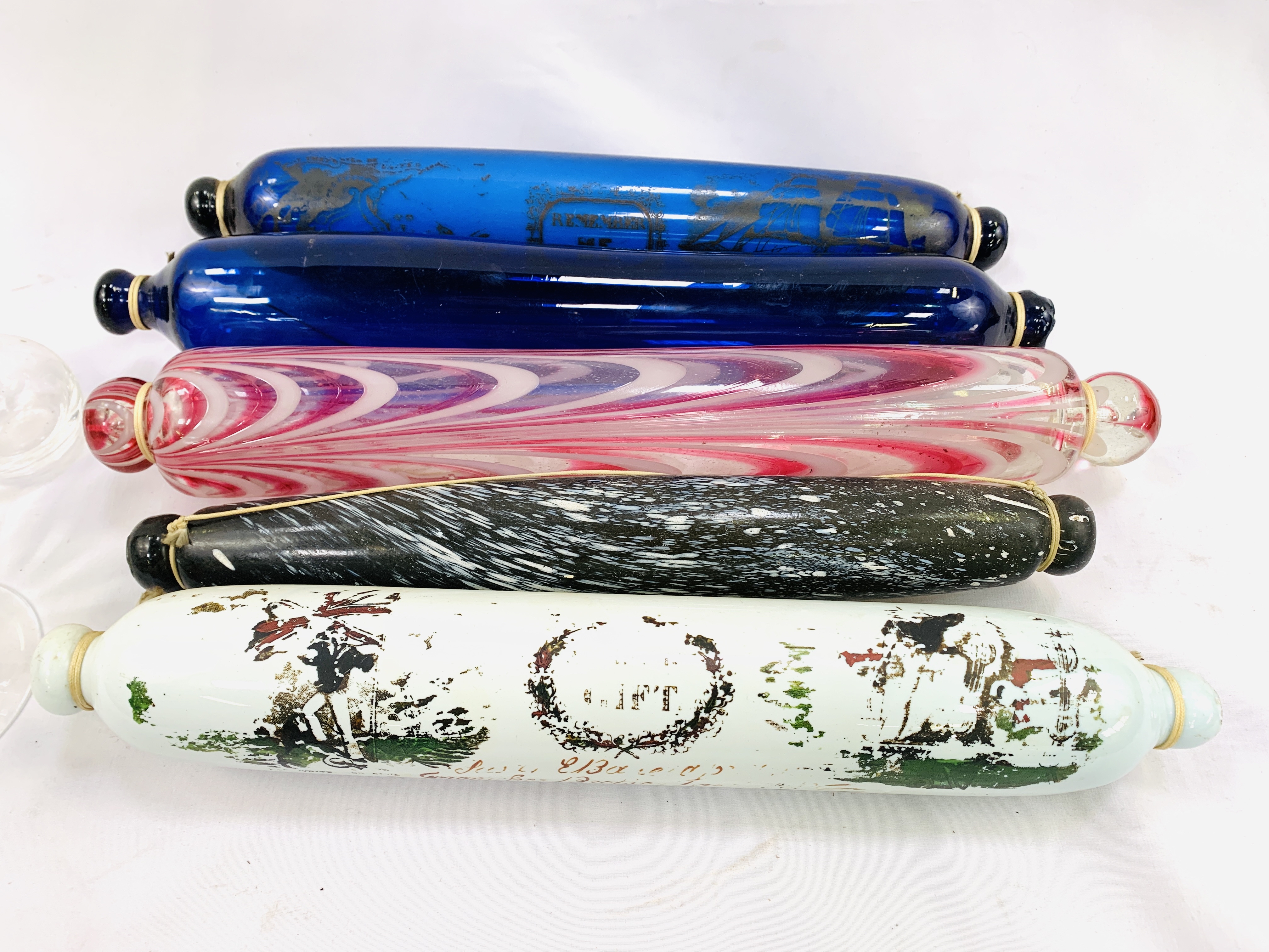 A group of 5 glass rolling pins, a lustre glass and a Wedgwood glass eau de cologne bottle