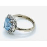 White gold aquamarine and diamond cluster ring