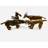 A group of four early 20th century wooden articulated animal figures