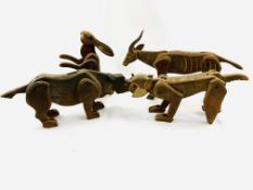 A group of four early 20th century wooden articulated animal figures