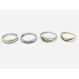 Four 9ct yellow and white gold rings