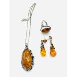 Amber and white metal necklace