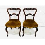 A pair of Victorian mahogany dining chairs