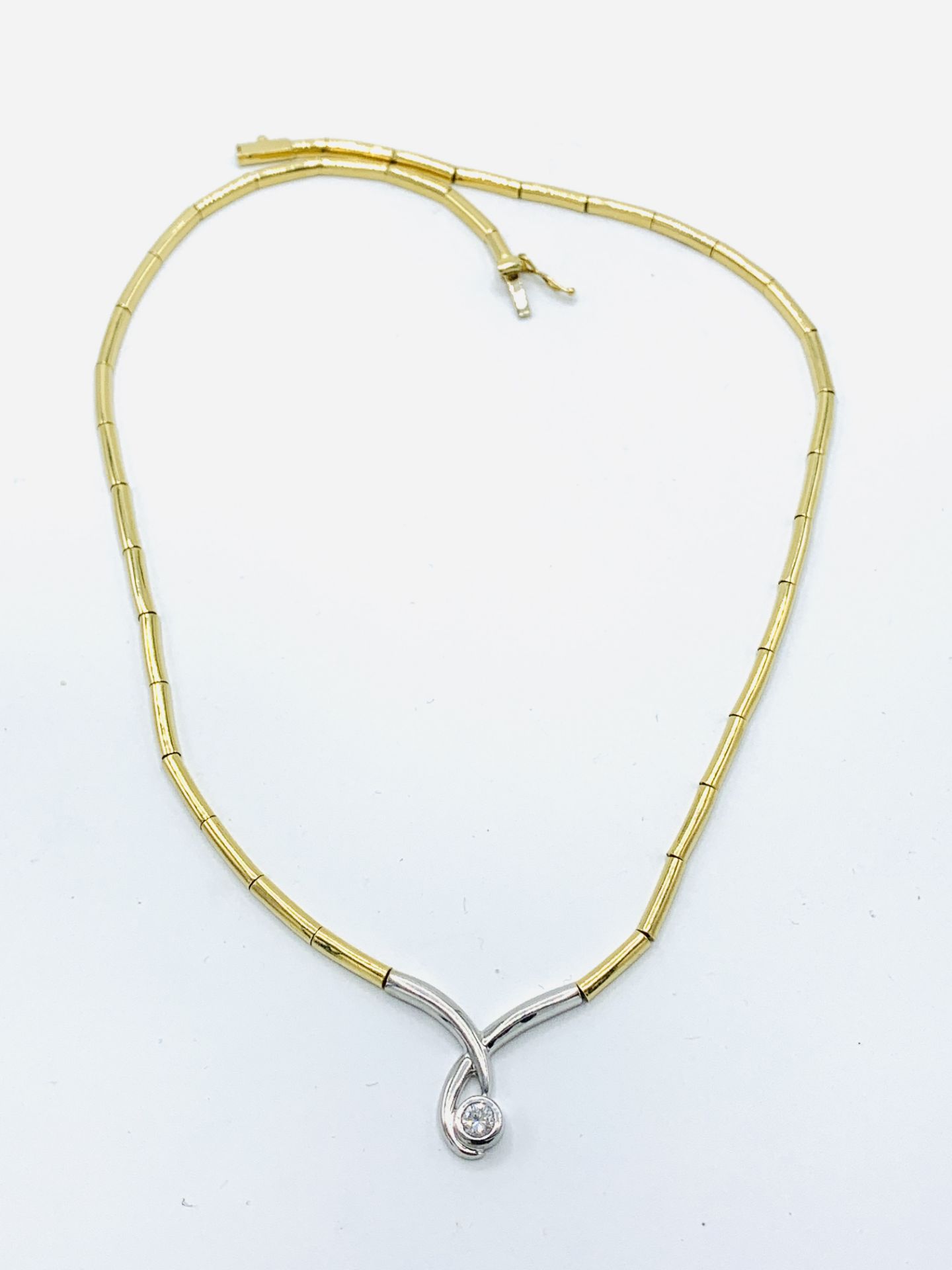 18ct yellow and white gold articulated solitaire diamond necklace