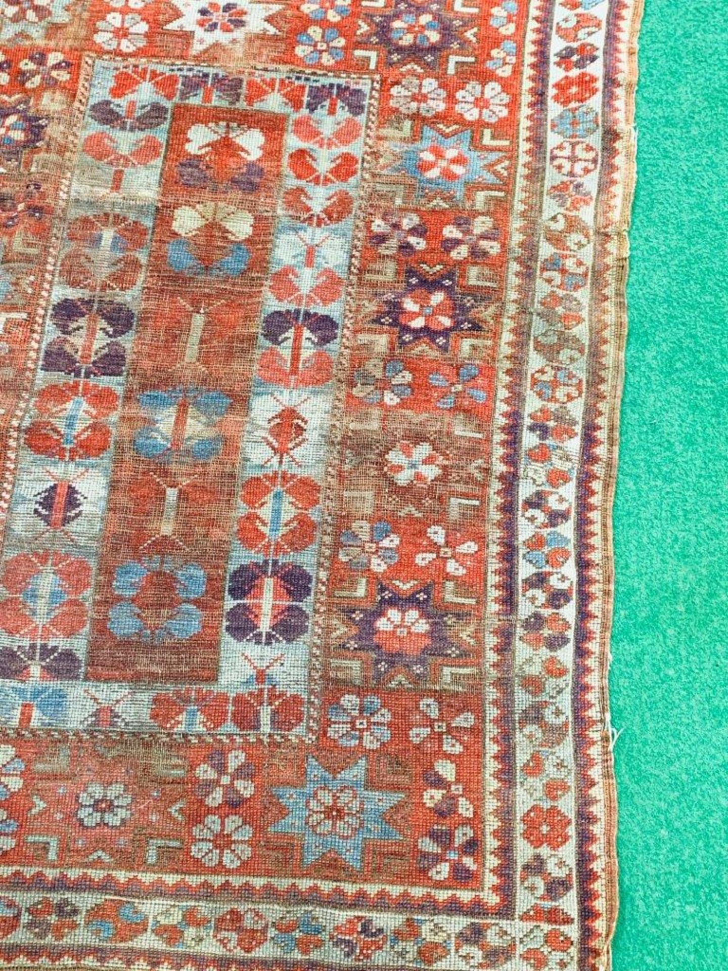 Small red ground hand knotted rug - Image 4 of 4