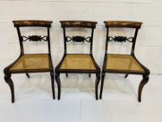 Three mahogany cane seat dining chairs