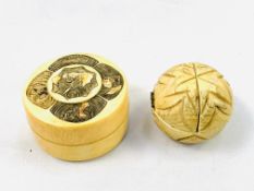 An ivory pot engraved with the heads of wild animals and a carved ivory ball with double hinged lid