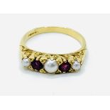 18ct yellow gold ruby and seed pearl ring.