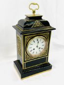 Brass and black lacquered mantel clock by L. Martie et Cie