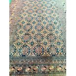 Coral ground hand knotted rug