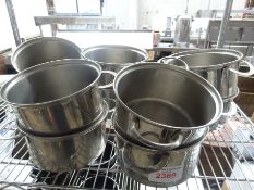 Ten stainless steel pots