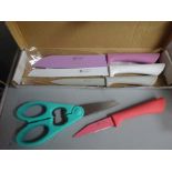 Four piece knife set with scissors.