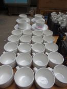 24 cups and saucers