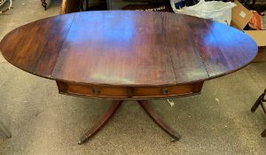 A mahogany sofa table