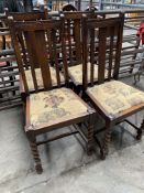 Four oak framed rail back dining chairs