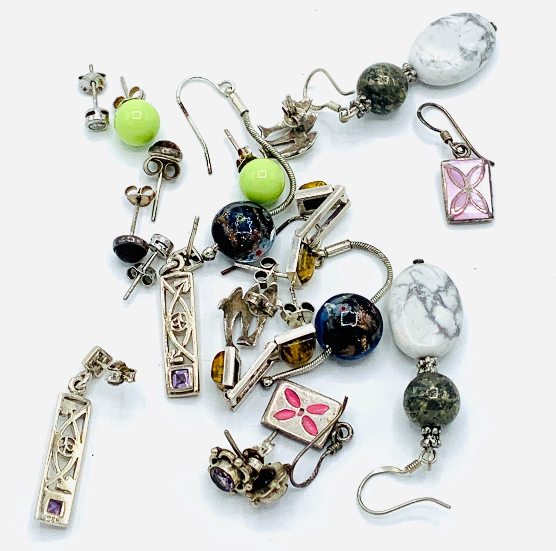 Ten various pairs of earrings