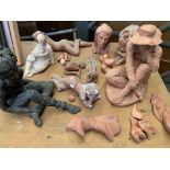 Eleven terracotta sculptures and a bronze-coloured resin sculpture, by Fiona Goldbacher