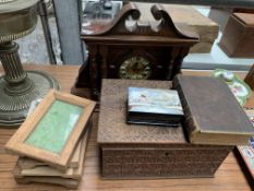 Brass oil lamp, clock, leather bound bible, and other items