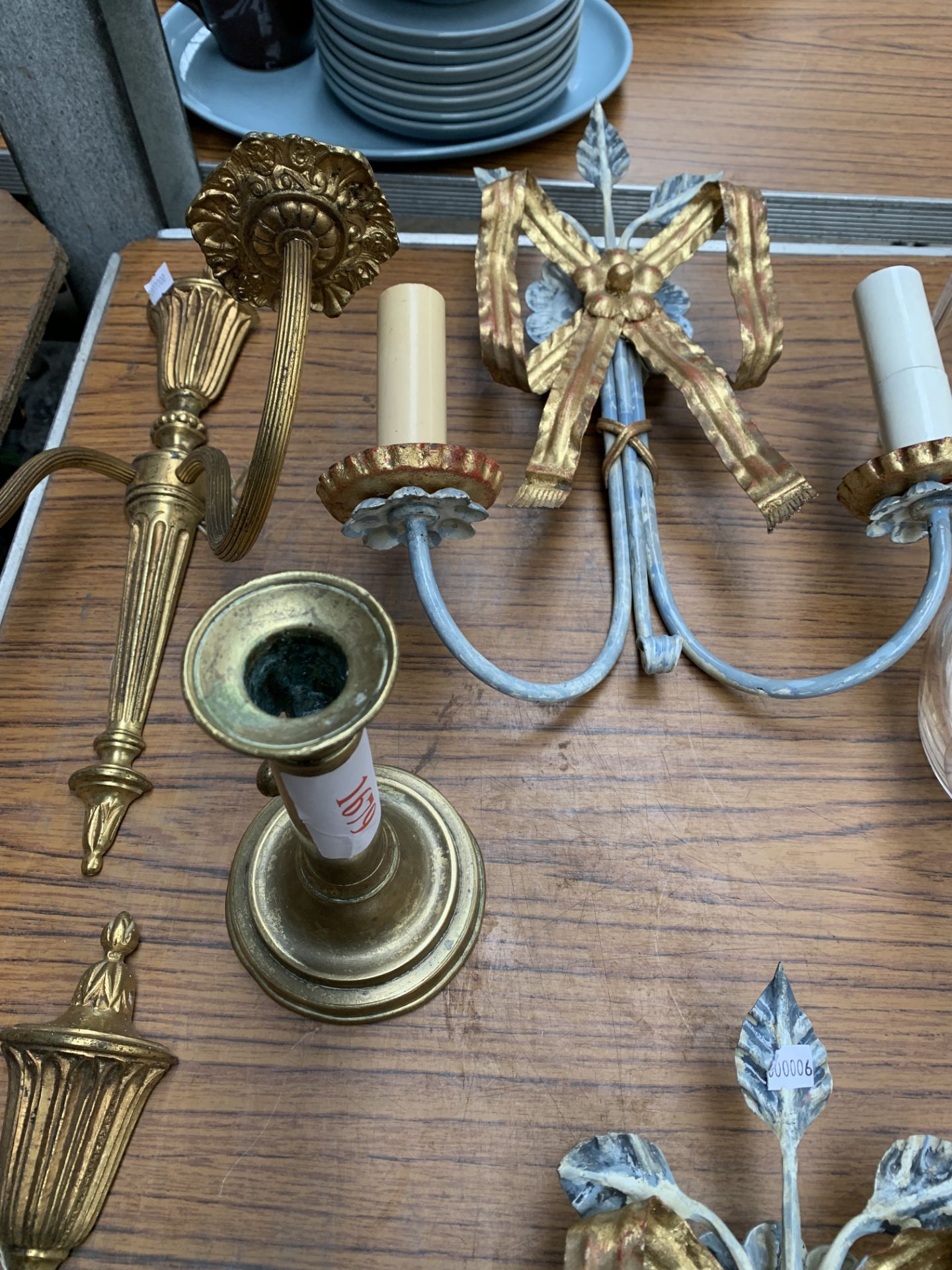 A pair of brass two branch wall sconces, a pair of decorative wall sconces, and a brass candlestick - Image 5 of 5