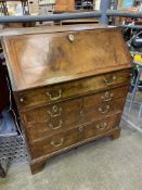 Early 19th century walnut veneer drop-front bureau