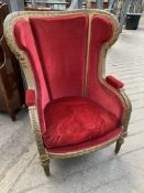 French style gilt wood and plaster decorative framed wing back armchair