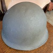 A French military helmet by J. Dunois & Fils, Vincennes, dated 1953