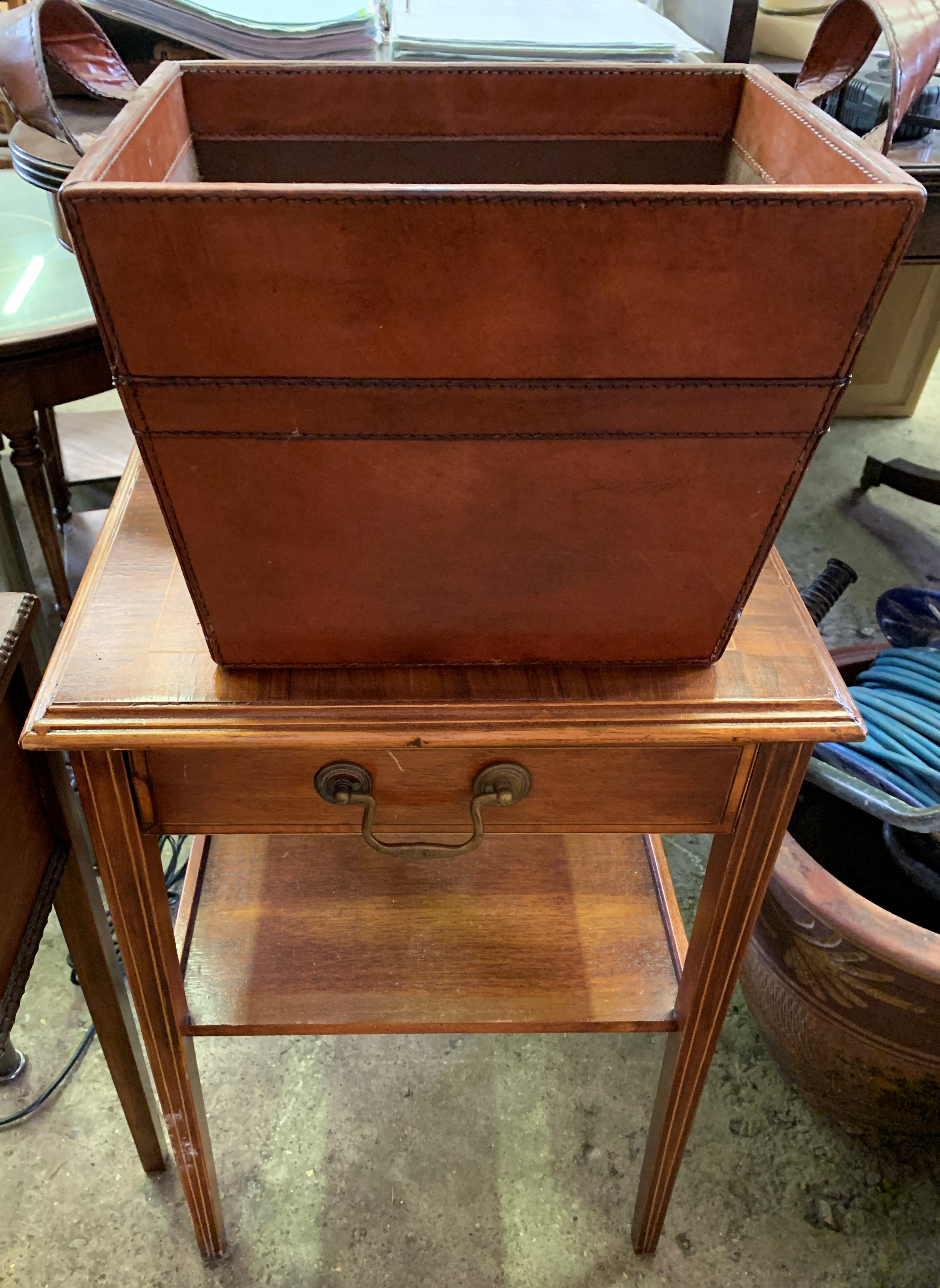 Mahogany occasional table, a mahogany sewing box and a leather covered waste paper basket