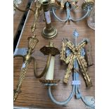 A pair of brass two branch wall sconces, a pair of decorative wall sconces, and a brass candlestick