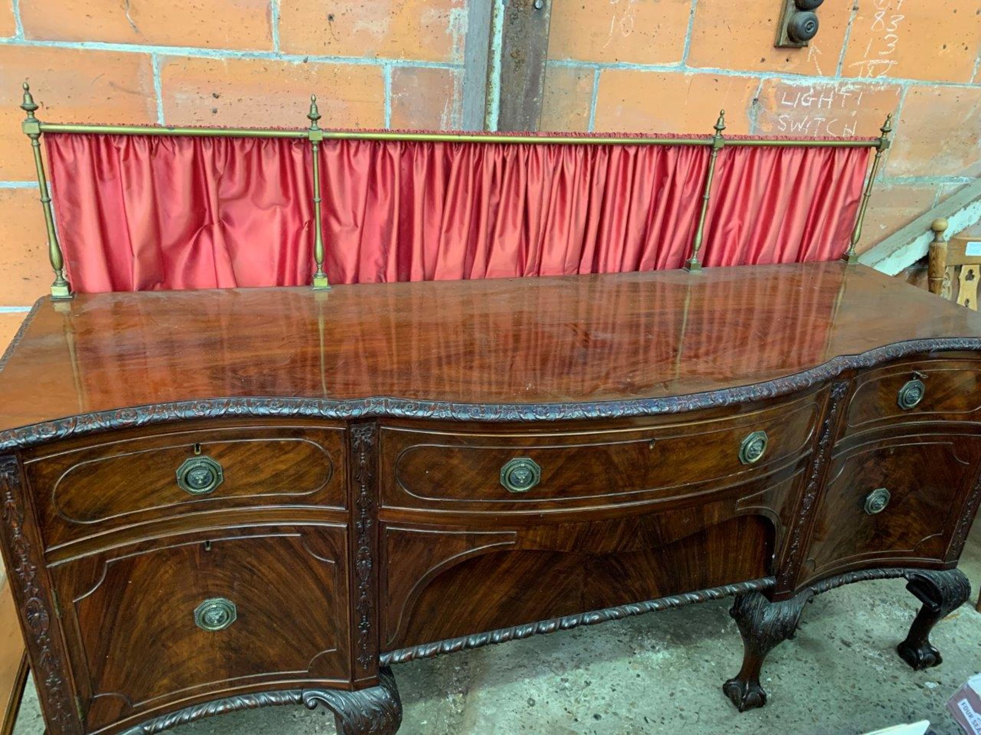 Carved mahogany bow fronted Victorian sideboard