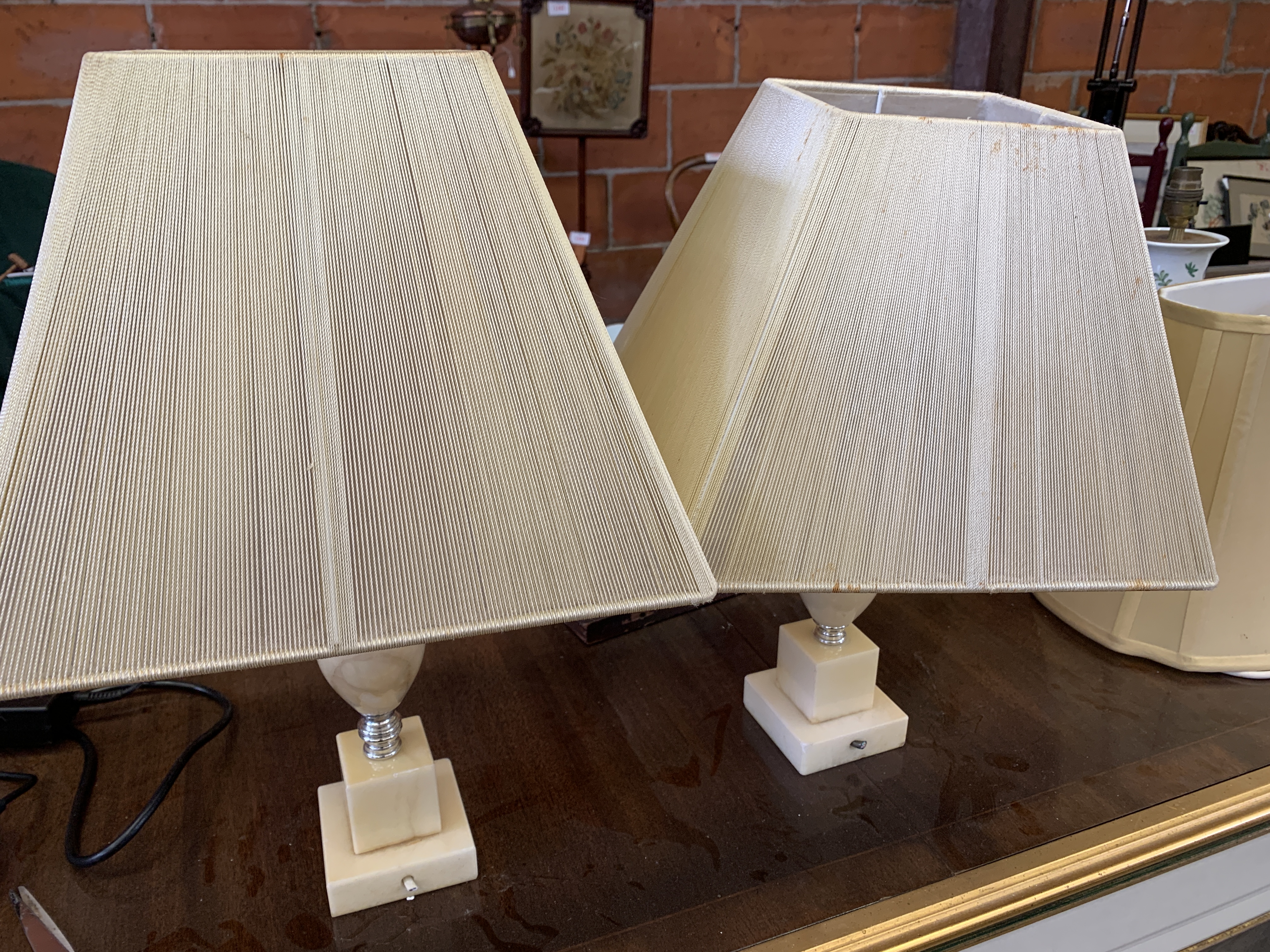 Two onyx table lamps with shades