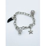 925 Silver charm bracelet with four various charms