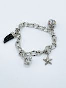 925 Silver charm bracelet with four various charms